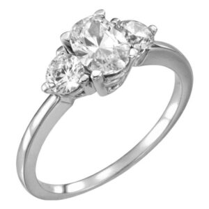 1.25 Carat Three-Stone Oval and Round Diamond Engagement Ring