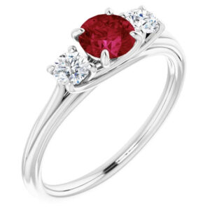 three stone "AA" rated ruby and diamond ring